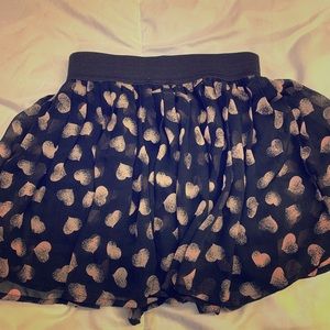 Extra Small Mini Skirt with Heart Print. Cute Girl